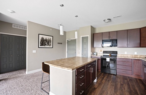 West Des Moines Apartment | Inviting Balcony Retreat with Pool and Pet-Friendly Perks