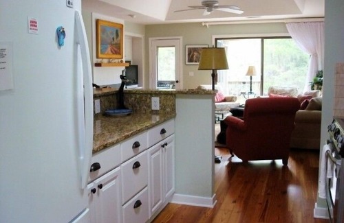 West Beach Cottage | Charming Cottage with Lagoon View, Steps from Beach & Pool