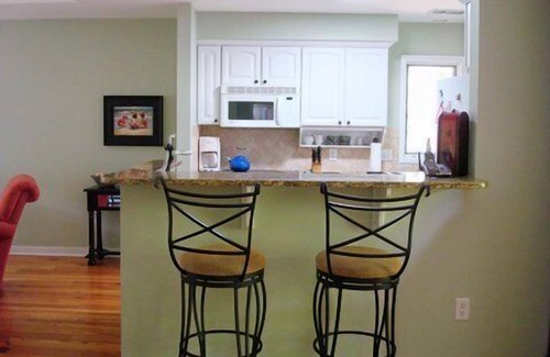 West Beach Cottage | Charming Cottage with Lagoon View, Steps from Beach & Pool