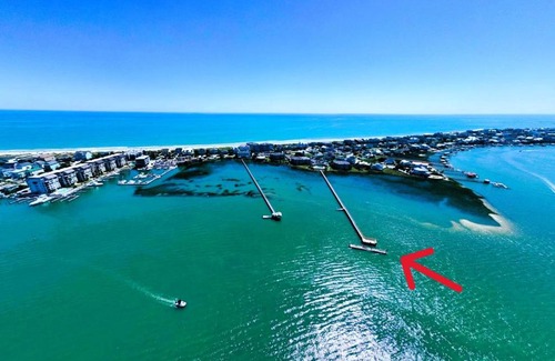 Gulf Stream Estates Apartment | Inviting Condo with Beach Access, Pool, and Dockside Views