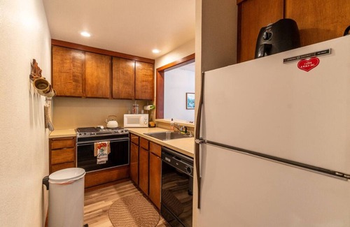 Glacier Condo | Inviting Condo Retreat with Pool, Hot Tub & Sauna