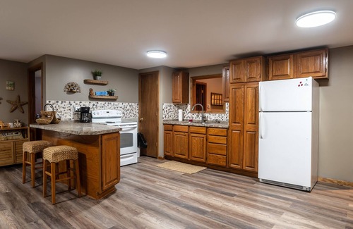 Harrison Cottage | Inviting Cottage in Michigan with Ocean Views & Family Amenities