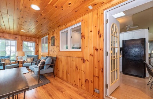 Walloon Lake Cottage | Inviting Lakeside Cottage with Hot Tub and Pet-Friendly Options