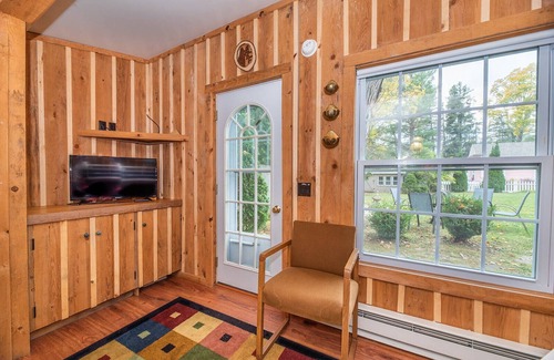 Walloon Lake Cottage | Inviting Lakeside Cottage with Hot Tub and Pet-Friendly Options
