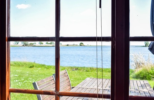 Fagelmara House | Charming Beachfront Cottage with Ocean Views & Spa Amenities