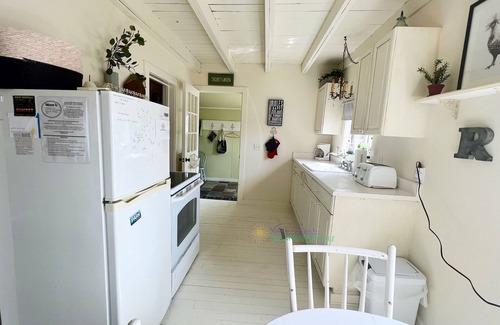 Suttons Bay Cottage | Charming Cottage with Private Pond Near Casino and Bay