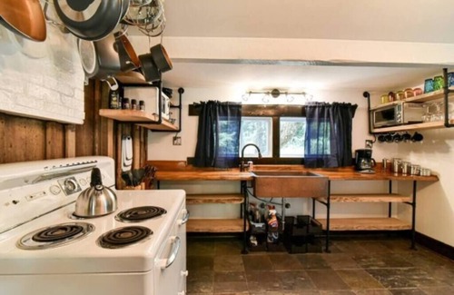 Asheville Cabin | Inviting Creekside Cabin with Hot Tub and Sauna Escape