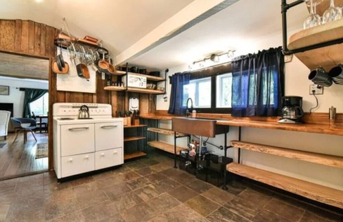 Asheville Cabin | Inviting Creekside Cabin with Hot Tub and Sauna Escape