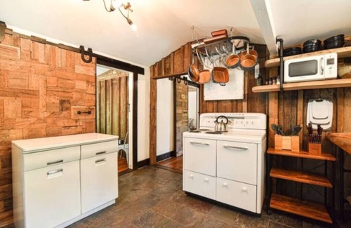 Asheville Cabin | Inviting Creekside Cabin with Hot Tub and Sauna Escape