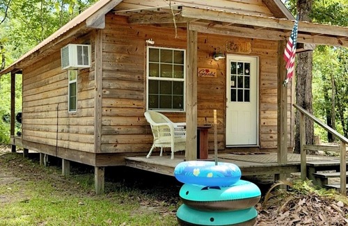 Perkinston Cabin | Serene Creekside Cabin Retreat with Pool and Breakfast