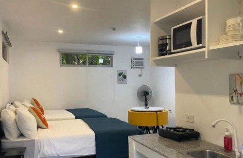 Sipalay Hotel | Inviting Deluxe Suite at Lopez Beach Resort with Ocean View