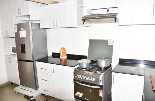 Kigali House | Inviting Double Room with Workspace & Private Bath in Kigali