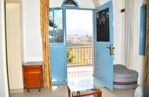 Kigali House | Inviting Double Room with Workspace & Private Bath in Kigali
