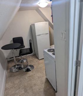 Sunnyside Apartment | Charming Downtown One Bedroom with Free Parking & Breakfast