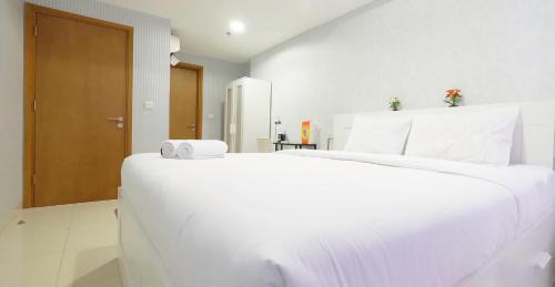 Old Jakarta Apartment | Elegant Oceanfront Retreat at The Mansion Jasmine Tower