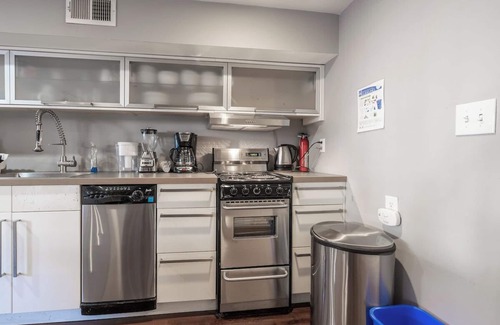Adams Morgan Apartment | Modern 2-Bedroom Apartment with Exposed Brick & Spa