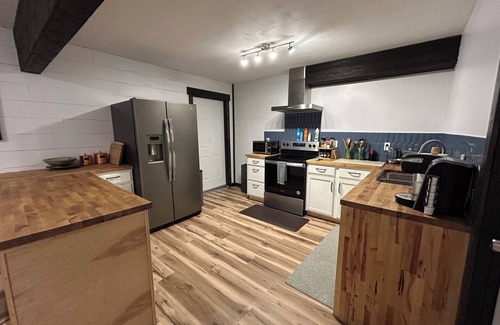 University Area Apartment | Inviting Family Retreat with Hot Tub & Pet-Friendly Amenities