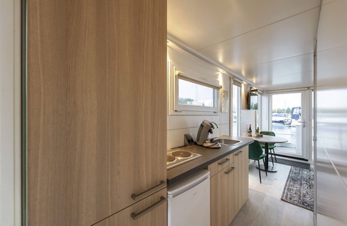 Heugum Boat Rental | Inviting Boatlodge "Mallorca" with Kitchen & Breakfast