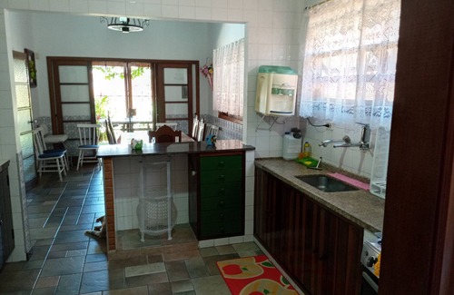 Peruibe House | Inviting Beachside Retreat with Pool & Barbecue Access