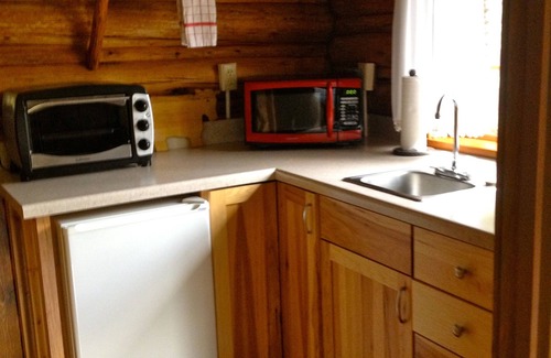 Wilson Cabin | Inviting Log Cabin Retreat at Historic Trail Creek Ranch