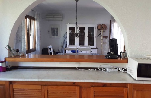 Cala Llombards Ski Chalet | Charming Holiday Home with Ocean View and Rooftop Terrace