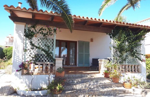 Cala Llombards Ski Chalet | Charming Holiday Home with Ocean View and Rooftop Terrace