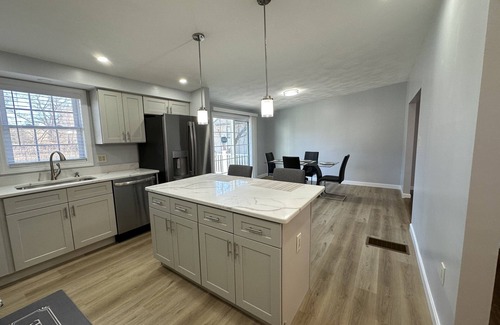 Worcester House | Inviting Home Near Shopping Center with Two Kitchens & Living Rooms