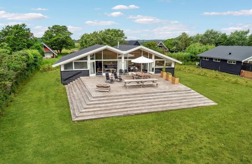 Elsegarde Strand House | Practical Cottage with Oceanfront Views Steps from the Beach
