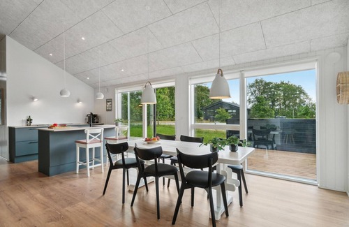 Grenaa House | Inviting Cottage with Oceanfront Views and Spa Amenities