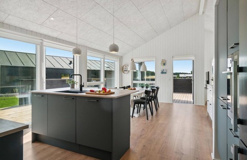 Grenaa House | Inviting Cottage with Oceanfront Views and Spa Amenities