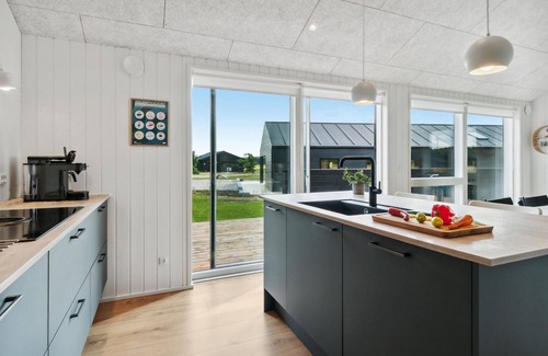 Grenaa House | Inviting Cottage with Oceanfront Views and Spa Amenities