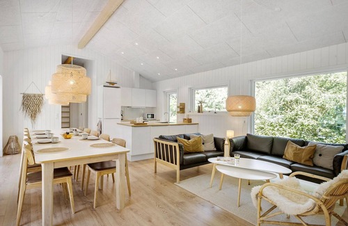Helberskov Strand House | Inviting Cottage with Scenic Views of Mariager Fjord