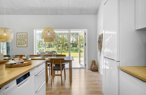 Helberskov Strand House | Inviting Cottage with Scenic Views of Mariager Fjord