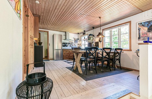 Bedegaard House | Cozy Family Getaway: Embrace Nature in a Red Wooden House