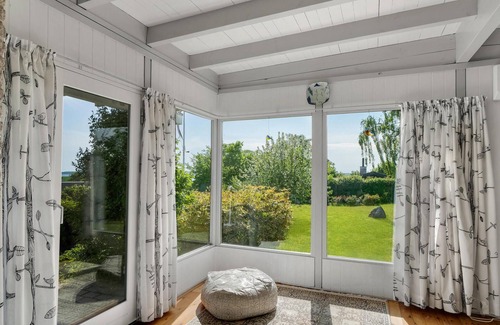 Olsted House | Cozy Vacation Home with Ocean Views at Ølsted Strand