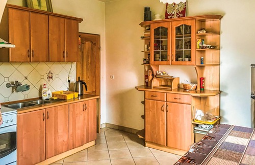 Orzysz House | Idyllic Cottage Retreat with Lake Views and Spa Access