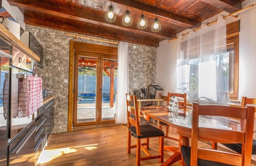 Perusic House | Charming Cottage Getaway with Pool and Lake Views
