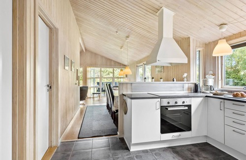 Spodsbjerg House | Explore a Cozy Wooden Holiday Home with Ocean Views