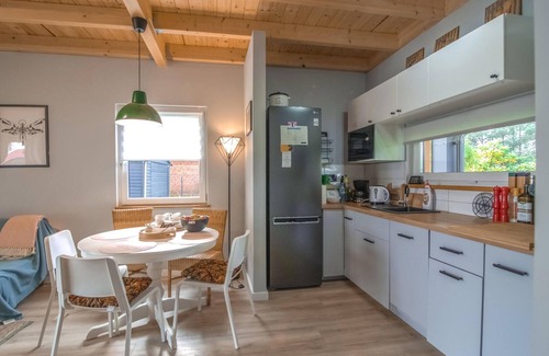 Ilawa House | Cozy Cottage Retreat Steps from the Beautiful Lake