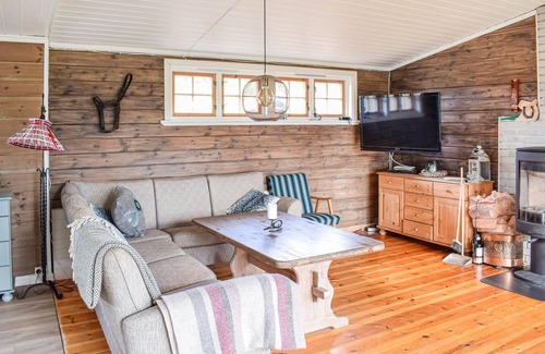 Sjusjoen House | Experience Nature in a Cozy Wooden Cottage Retreat