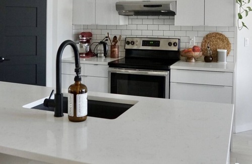 Fort Gary House | Comfortable Suburban Retreat for Families and Travelers