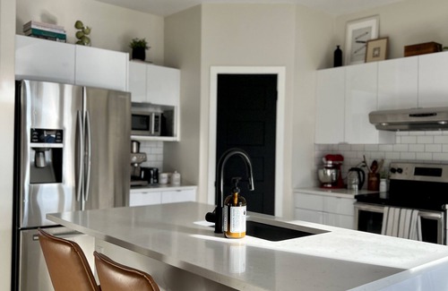 Fort Gary House | Comfortable Suburban Retreat for Families and Travelers