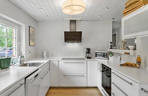 Bøtø By House | Spacious 8-Bedroom Haven in Væggerløse with Ocean Views