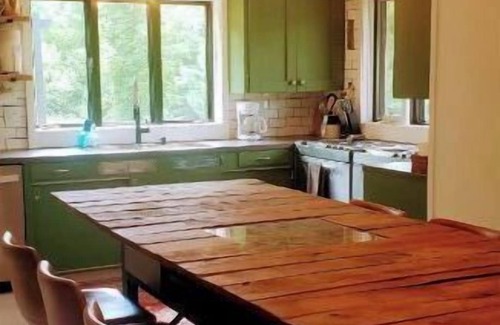 Maple City House | Charming Retreat in Leelanau County with Ocean Views