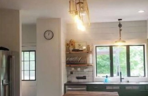 Maple City House | Charming Retreat in Leelanau County with Ocean Views