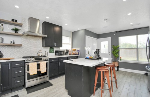 Houston House | Inviting Home with Surround Sound and Family-Friendly Amenities