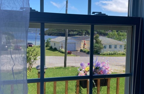 Norris Point Cottage | Charming Retreat with Breathtaking Views & Family Amenities