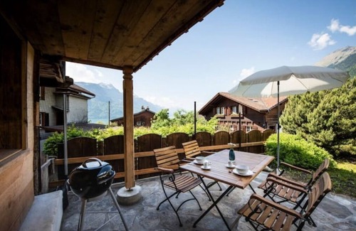Brienz House | Inviting Village Center Retreat for Families and Friends