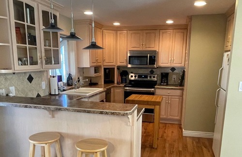 Saratoga House | Inviting House on Quiet Street with Ample Parking Options