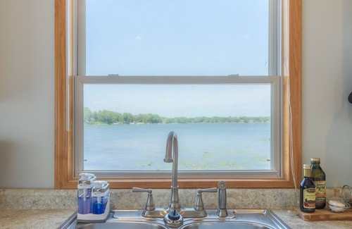 Lindstrom House | Inviting Lakefront Retreat with Spa and Ocean Views